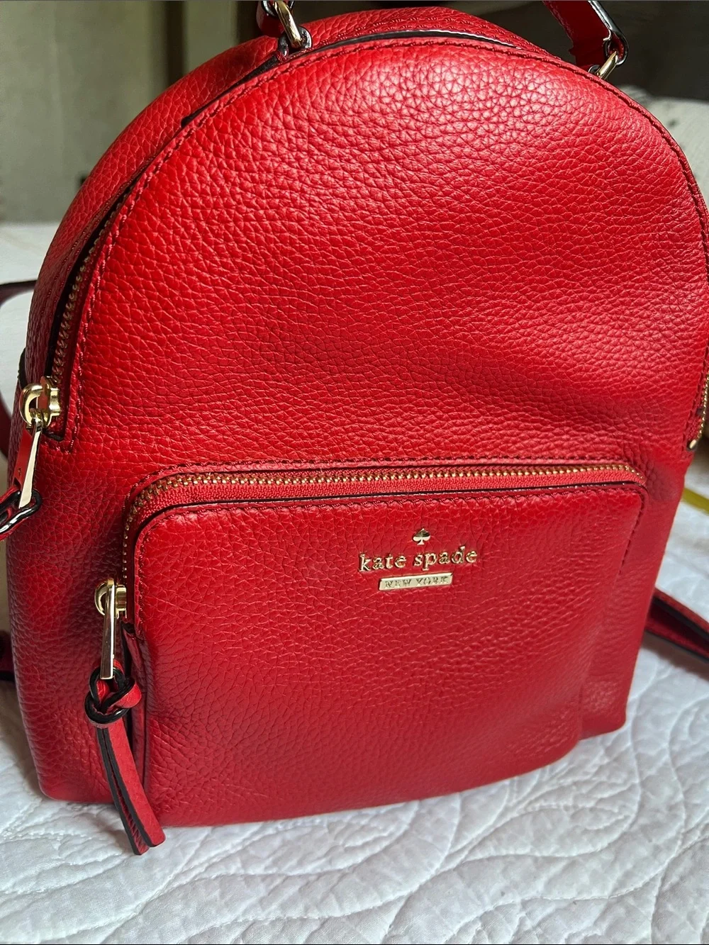 kate spade red pebbled leather mini backpack with gold hardware